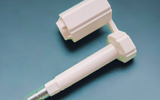 Container security bolt seals with plastic body and metal locking pin.