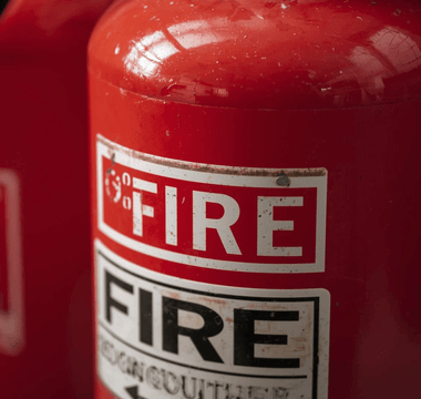 Image showing why plastic seals matter on fire extinguishers.