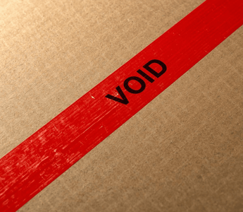 tamper-evident sticker on a cardboard box