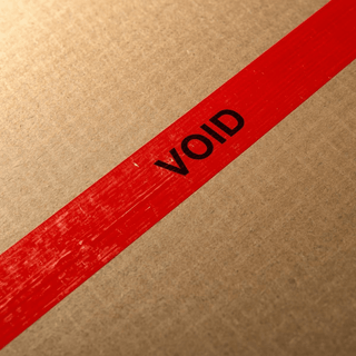 tamper-evident sticker on a cardboard box