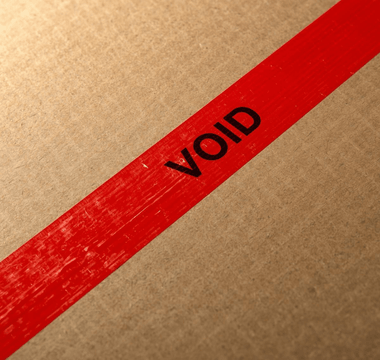 tamper-evident sticker on a cardboard box