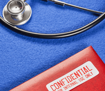 A stethoscope beside a red folder labeled "Confidential," featuring a tamper-evident seal for medical records security.