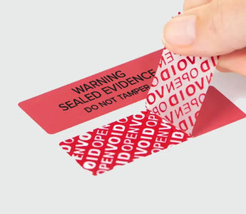 Tamper-Evident Residue Labels for Secure Shipping